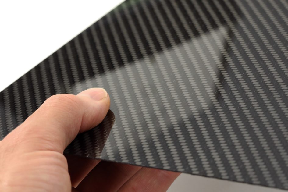 CFS carbon fibre sheet in hand reflection