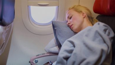 best way to sleep on a plane